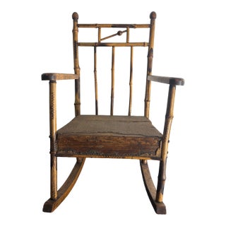 Vintage Child's Burnt Bamboo Rocking Chair With Spindle Back For Sale
