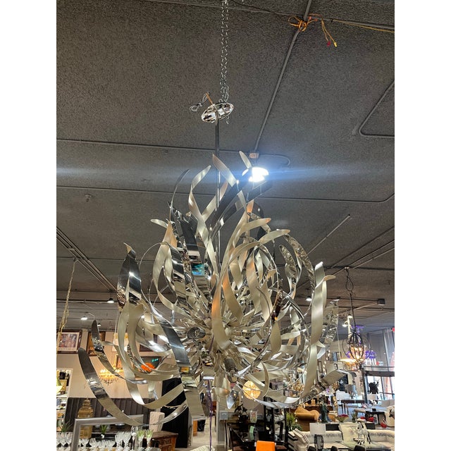 Boldly artistic and undeniably glamorous, the Corbett Lighting “Graffiti” Chandelier is a striking statement piece that...