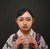 Archaic Prayer by Kazuya Ushioda | Oil Painting of a woman in traditional clothing with hands clasped For Sale