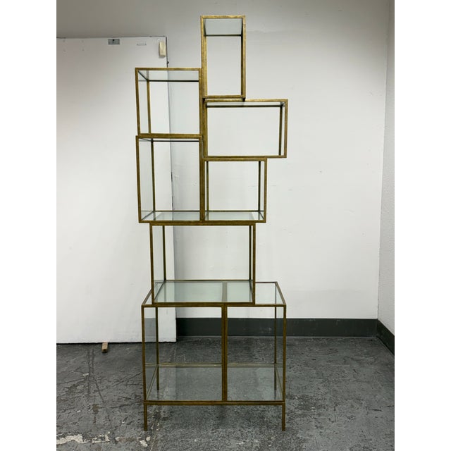 Design Plus Gallery presents the Rubiks Shelf from Oly Studio. The sculptural iron frame is composed of offset rectangular...