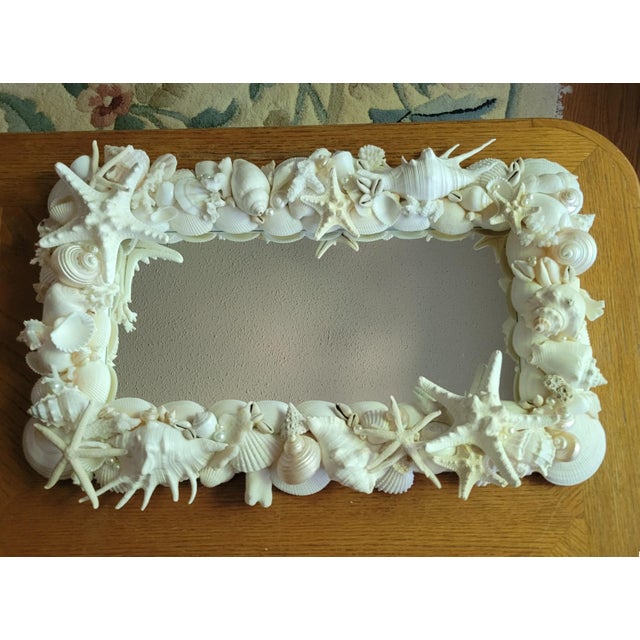 WHITE SEASHELL CORAL MIRROR Stunning array of several natural White and Pearlized Seashells along with pieces of authentic...
