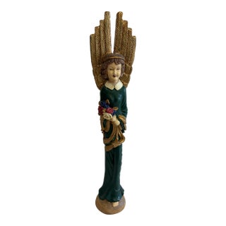 Vintage Carved Angel Figurine With Gold Feathered Wings and Painted Floral Bouquet For Sale