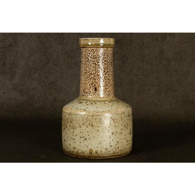 Danish Vintage Ceramic Vase by Nils Kähler 1960s. Vintage stoneware table vase in green and earth colored glaze. Marked in...