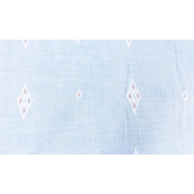 Effortlessly graceful and serene, this vintage Indian Dhurrie rug exudes a quiet sophistication rooted in traditional...
