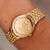 Rolex Cellini, reference 6621, in 18K yellow gold with a 26mm case and a champagne gold dial set with factory original...