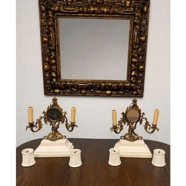 Bring a touch of Old-World European elegance to your home with this stunning matched pair of Rococo-style brass...