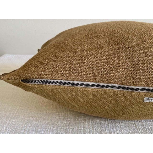 Custom linen blend accent pillow with down insert Color: cappuccino fromentera A copper / brown colored nubby textured...