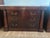 An exceptional pair of Baker Furniture three-drawer chests, distinguished by their commanding architectural proportions,...