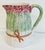 Vintage Majolica style pitcher with asparagus spear motif. Burgundy heads on green stalks all tied up with a brown bow....