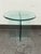 Design Plus Gallery presents a Vintage Round Glass Side Table. This vintage round side table exudes postmodern charm with...