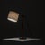 This elegant table lamp was produced by Falkenbergs Belysning in Sweden during the 1960s. Combining brass with a warm-...