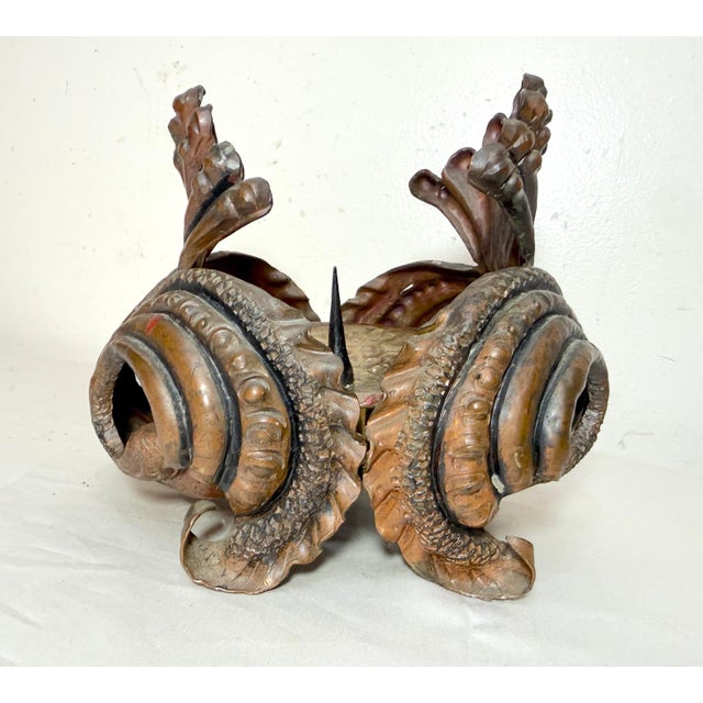 This antique handmade forged copper brutalist style candle holder is a unique and distinctive piece that adds a touch of...