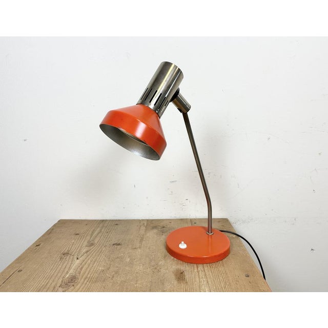 This table lamp was produced by AKA Electric in former DDR ( East Germany) during the 1970s. It features an aluminium...