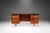 This commanding V-shaped executive desk, inspired by the innovative designs of Harvey Probber, captures the sleek...