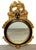 Carvers' Guild Louis XVI Style Giltwood & Ebonized Oval Wall Mirror, Circa 1965. This elegant early Carvers' Guild mirror...