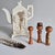 This charming trio of miniature Kokeshi dolls originates from mid-century Japan, showcasing traditional artisan...