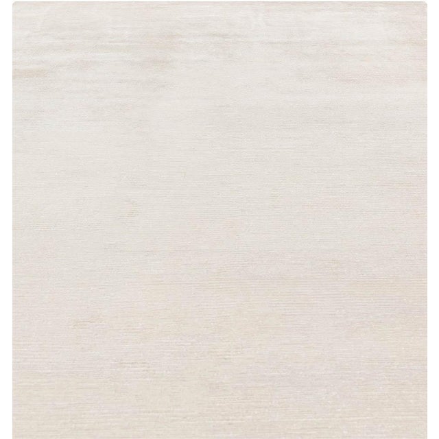 Modern Minimalist Solid Wool Rug in Soft Beige by Doris Leslie Blau. Size: 6'0" × 9'0" (182 × 274 cm) Effortlessly elegant...