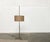 Mid-century floor lamp with a special base and shade. The special detail of this lamp is the simple tripod base. The drum-...