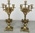 An ornate Vintage French pair of candelabras , beautifully presented with elaborate scrolling forms, floral decoration,...