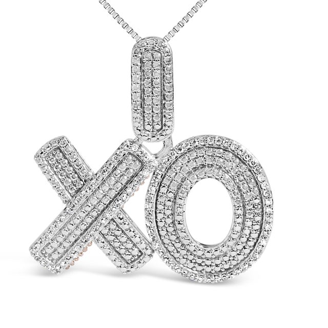 Embrace whispers of affection with this enchanting "XO" pendant necklace, where elegance and playfulness intertwine....