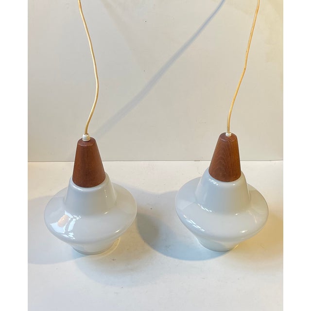 Danish Modern White Opaline Glass and Teak Pendant Lamps by Holmegaard, 1960s, Set of 2 For Sale - Image 10 of 11