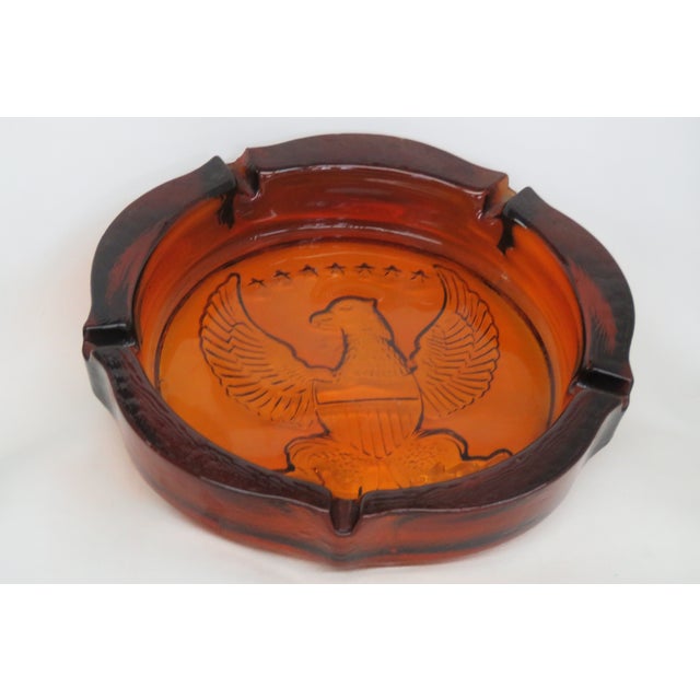 This magnificent collectible Ashtray is made of heavy Glass. It is a gorgeous piece of tobacciana with rich Amber Color,...