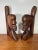 Beautiful vintage pair of hand-carved wooden figural bookends featuring two stylized busts facing one another. Rich warm...