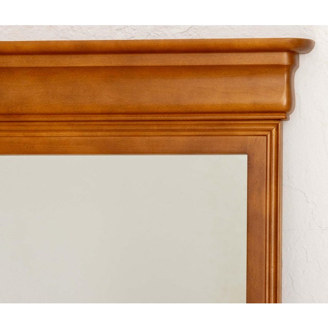 Canadian Neoclassical Style Maple Framed Mirror, marked and with label to reverse. Overall: 47.25" H x 39.25" W 2.5" D....