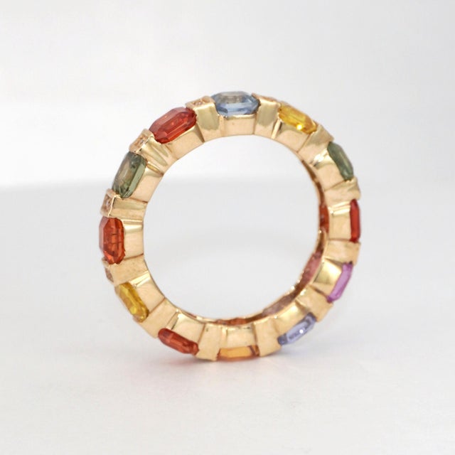 Experience the vibrant allure of our exquisite multi-gemstone ring, crafted with precision. This captivating piece, set in...
