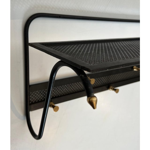 1950s 1950s Coat rack in black lacquered metal with perforated sheet metal and brass For Sale - Image 5 of 12