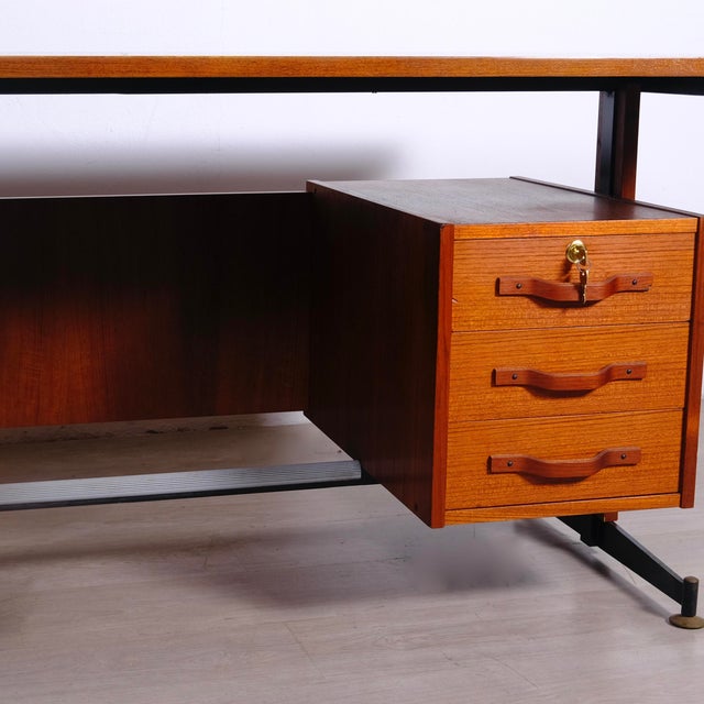 Beautiful mid-century desk with drawers, 1960s design, unique curved wood handles. Dimensions: Maximum height 76.5 cm...