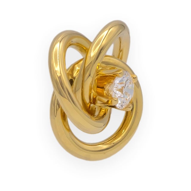 Tiffany & Co. three hoop pendant in 18K yellow gold, dating to the 2000s, set with a round brilliant diamond at the...