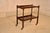 Period Edwardian oak bar cart from England, circa 1900. This cart has two shelves, both with galleries surrounding them on...