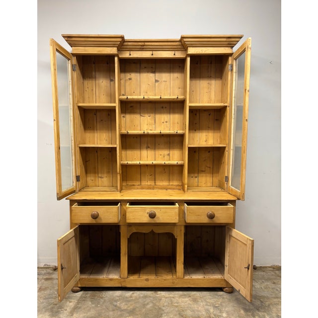 This 19th-century English pine dresser carries the quiet confidence of a piece that has spent generations being useful,...
