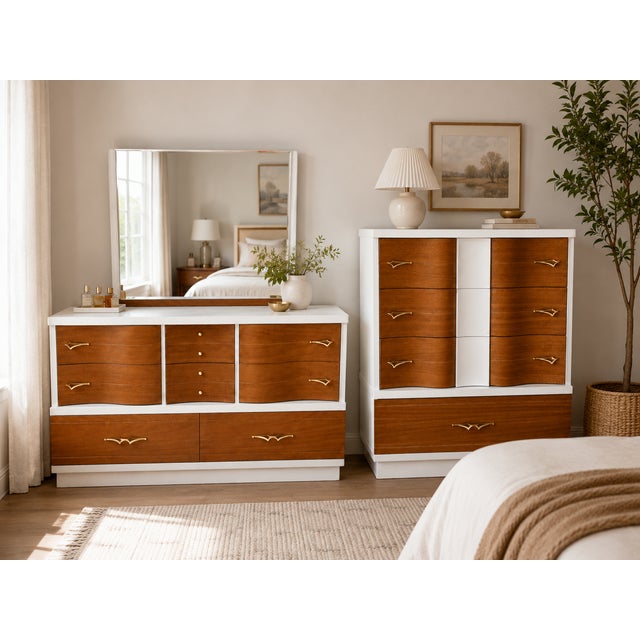 A striking matching vintage Mid-Century Modern dresser set consisting of an 8-drawer lowboy and coordinating 4-drawer...