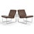 These handsome leather Ole Gjerløv-Knudsen "Moduline" lounge chairs are as comfortable as they are rare. Designed as part...