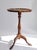 Victorian style English wooden table with a green leather top with golden details. Very useful to place at any space in...