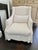 Lovely slipcovered accent chair from the home decor boutique Belle Escape. The creamy white slipcover is made of Belgian...