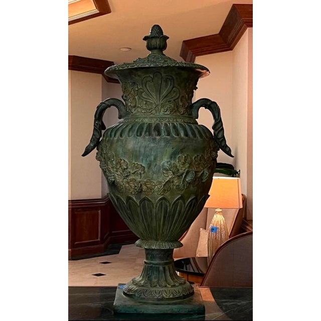 This exquisite urns are truly a statement piece for a grand entrance, heavy bronze with verdigris patina timeless design...