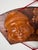 A decorative Japanese wall hanging featuring carved wooden masks of Ebisu and Daikoku, two of Japan’s Seven Lucky Gods...