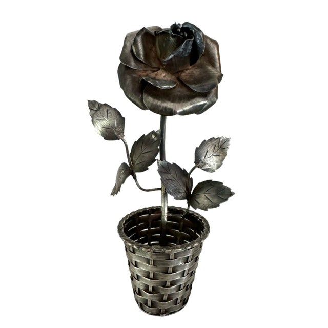 Sterling silver Janna Thomas attrib flower. Potted in a woven Sterling basket. Looks lovely with some moss inside.