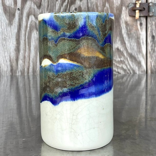 A fantastic vintage Boho vase. A chic signed studio pottery vase. Beautiful hand painted blues and greens. Acquired from a...
