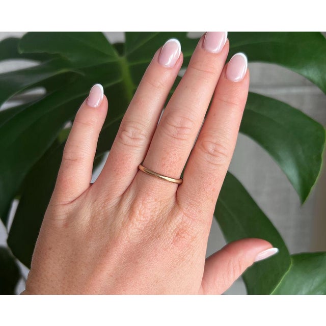 8K Yellow Gold Wedding Band A timeless and elegant wedding band crafted in 18K yellow gold (750/1000). With its refined...