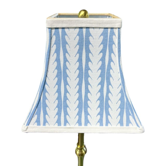 Beautiful pair of brushed gold buffet lamps with custom shades made from Serena & Lily fabric in the “Oceana” pattern.