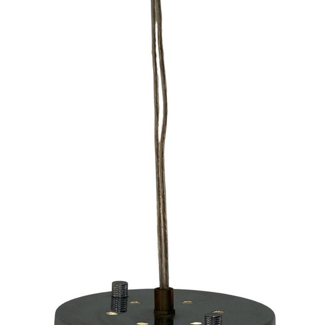 Attributed to Guzzini but not marked. The pendant light is made of white acrylic, a white acrylic diffuser, and a chrome...