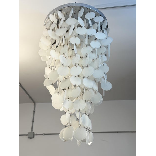 Murano glass waterfall chandelier in the style of Verner Panton, 1970s. Three lights. E27 bulbs. Metal frame with circular...