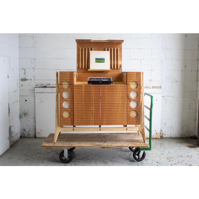 A beautiful addition to your space, the Hank turntable console is a perfect mixture of mid-century lines and...