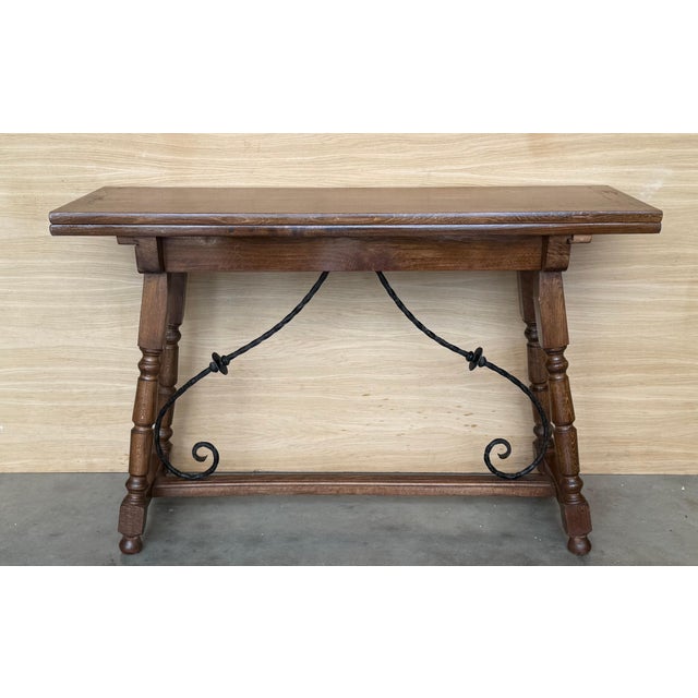 20th century Spanish console fold out farm table Works as both a dining table and console.