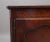 Early 19th Century French cherrywood dresser base, the rustic moulded edge top above two hinged doors with original...