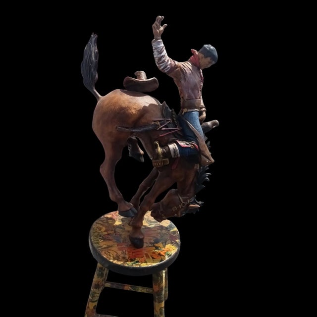 This striking, one-of-a-kind art sculpture captures the rugged spirit of the American West. The dynamic piece features a...
